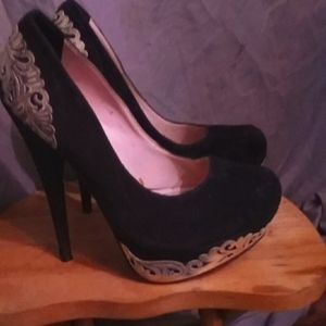 Black and metal stilettos